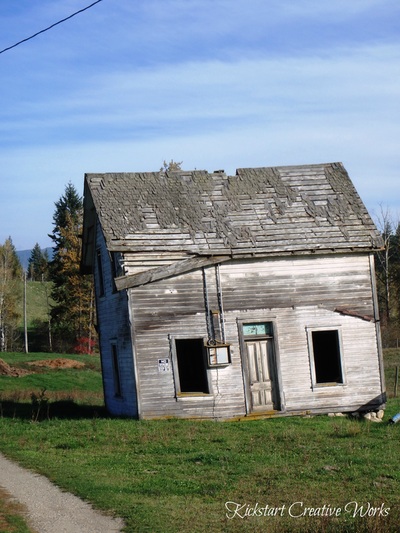 A leaning heritage building on a farm in Spallumcheen, BC.
